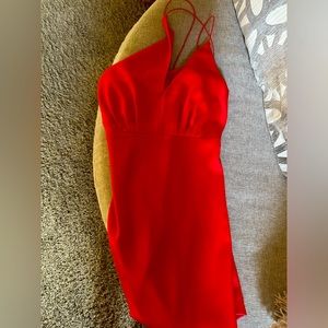 Red Cocktail dress by Glam. Large.  Asymmetrical spaghetti strap neckline